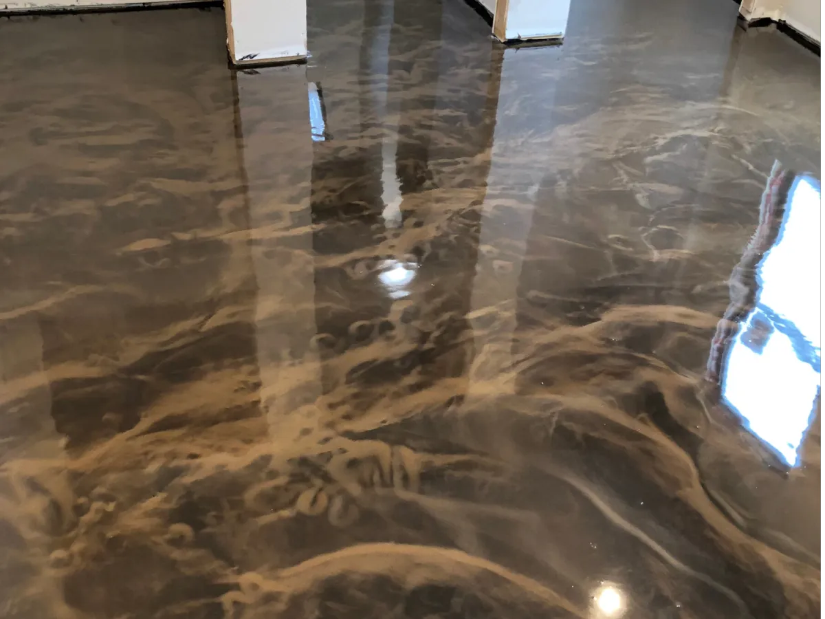Charcoal silver and red metallic epoxy floor finish